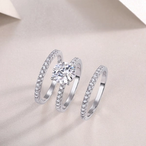 Luxury 925 sterling silver three-piece ring set with round moissanite and S925 hallmark