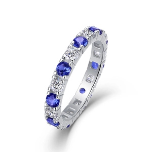 Bague éternité élégante en argent 925 avec saphirs bleus et oxydes de zirconium blancs