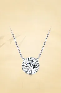 Detail of Moissanite pendant necklace with 925 silver chain and brilliant round cut stone