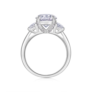 Luxury 925 sterling silver three-stone moissanite ring with a brilliant round center gem