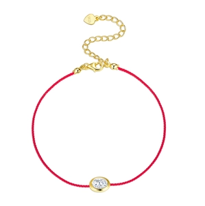 Detail of S925 sterling silver lobster clasp and heart tag on a red string bracelet