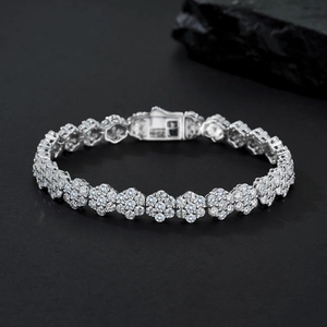 Elegant silver flower link bracelet with sparkling moissanite stones and secure clasp