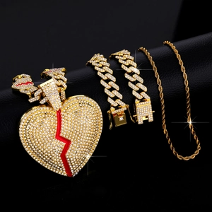 Pendaglio cuore spezzato hip hop con saetta rossa, catena cubana oro e set intrecciato