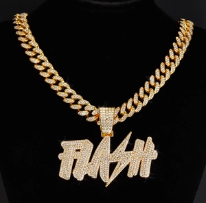 Close-up of golden hip hop Cuban chain featuring a iced-out FLASH lightning pendant