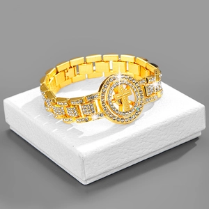 Macro shot of 18K gold plated hip-hop watch-style chain with a zircon encrusted cross pendant