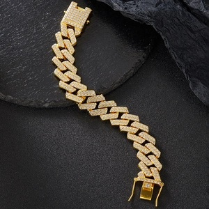 Macro view showing double row diamonds on a 20mm gold Cuban link hip hop chain