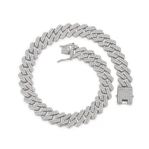 Close-up of 20mm silver Cuban link necklace with micro-paved double row diamonds and clasp