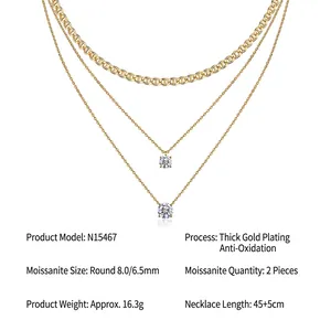 Goudvergulde minimalistische ketting met drie lagen en 8 mm en 6,5 mm moissanietstenen