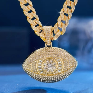 Hip hop style gold Cuban chain necklace with a iced out evil eye pendant for men