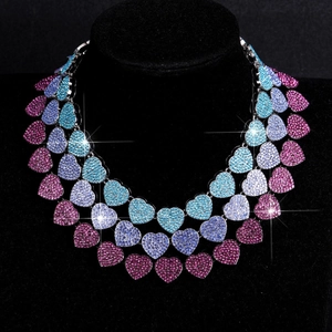 Luxurious 15mm heart Cuban link chain with colorful rhinestones on a black bust model