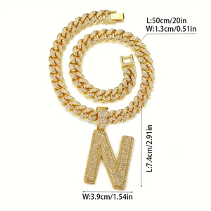 Detail showing dimensions of gold iced-out N letter pendant on a 50cm Cuban link chain