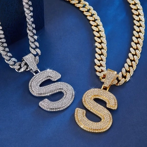 Iced out Cuban link necklace with large paved letter S pendant in gold and silver