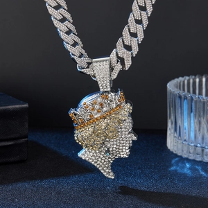 Close-up of hip hop queen portrait pendant with multicolored pavé diamonds on cuban chain