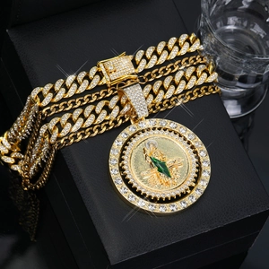 Gold-plated iced out Cuban link necklace with St. Jude pendant and green gems