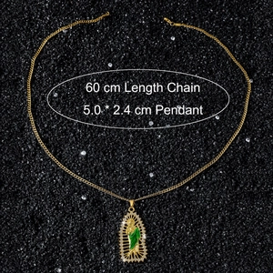 Close-up of gold Saint Jude pendant with white crystals and dimensions 5.0x2.4cm