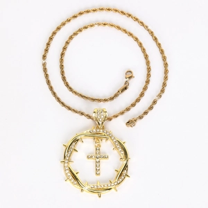Gold hip hop necklace with round thorn halo and diamond encrusted cross pendant