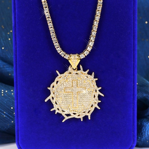 Gold thorns cross pendant necklace with tennis chain and sparkling rhinestones