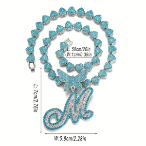 Icy silver butterfly and letter M pendant necklace with light blue rhinestones on white