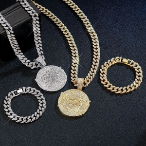 Hip hop jewelry set featuring iced-out Rich Gang round pendants with Cuban link chains