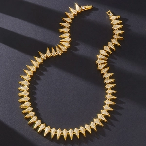 Detailed view of hip hop gold alloy necklace with sparkling rhinestones and a safety clasp