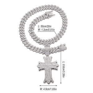 Detailed view of 50cm silver Cuban link chain with large iced-out cross pendant measurements