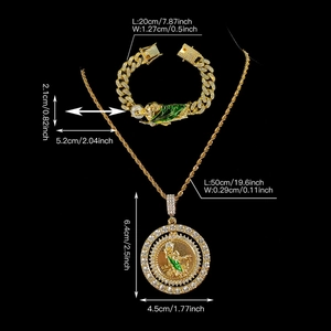 Gold Saint Jude jewelry set with crystal necklace and Cuban link bracelet on black background