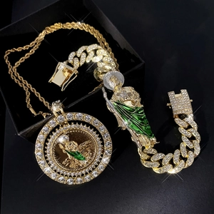 Iced out gold St. Jude pendant necklace and cuban bracelet set with green enamel details