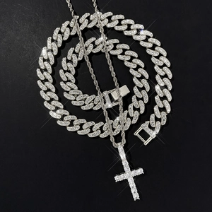 Iced out silver cross pendant set with cuban link chain and sparkling rhinestones