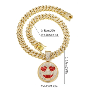 Detailed size chart for a gold iced-out Cuban link chain with a heart-eye smiley pendant