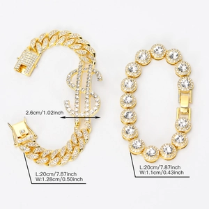 Detailansicht des goldenen Dollar-Kuban-Link und Tennis-Armband-Sets mit glänzenden Kristallen