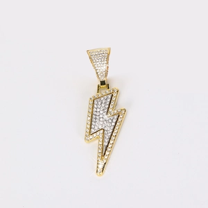 Detailed view of hip hop lightning pendant with gold plating and white zircon inlay