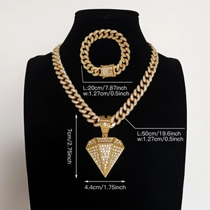 Golden hip hop Cuban link chain set with a large iced-out diamond-shaped pendant