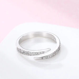 Detailed macro view of S925 sterling silver open ring with pavé set zircon stones