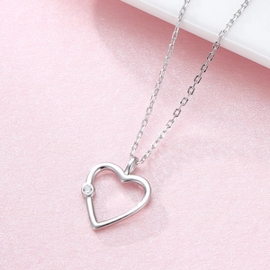 Minimalist S925 sterling silver hollow heart pendant necklace with clear zircon stone