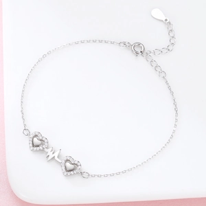 S925 sterling silver bracelet featuring double hollow hearts and heartbeat ECG line design