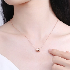 Elegant rose gold S925 sterling silver cylinder pendant necklace with a sparkling zircon