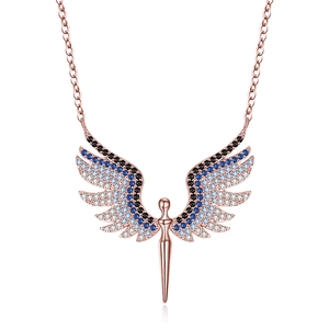 Close-up of rose gold angel wing pendant with blue and black gradient crystals