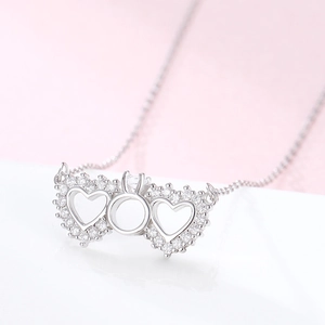 Elegant S925 sterling silver necklace featuring double hearts and a sparkling zircon pendant