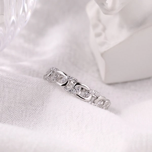 S925 sterling silver wave chain ring with pave zircon stones on white fabric
