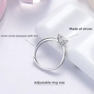 Detailed shot of S925 silver ring featuring a six-prong moissanite and adjustable band