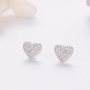 Close-up of S925 sterling silver heart stud earrings with pink pavé set zirconia crystals