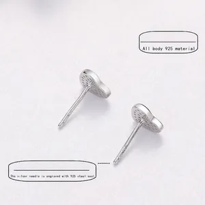 S925 sterling silver heart stud earrings with detailed hallmark and polished finish
