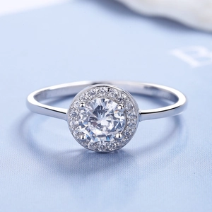 S925 sterling silver halo ring featuring a round four-prong cubic zirconia solitaire