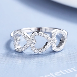 S925 sterling silver triple heart ring with sparkling zircons and a minimalist design