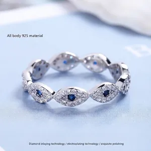 S925 sterling silver evil eye ring featuring full crystal pave and blue zircon stones