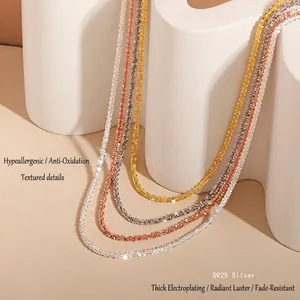 S925 sterling silver minimalist chain necklace in silver and gold on stone base