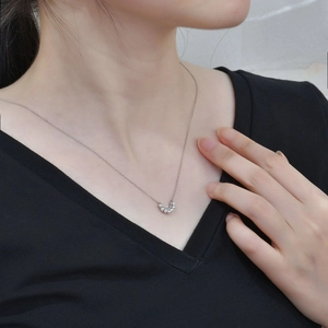 Elegant S925 silver necklace with U-shaped pearl pendant shown on a model neck