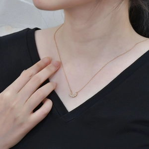 Elegant rose gold S925 sterling silver necklace featuring seven luminous white pearls
