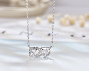 Close-up of 925 sterling silver 520 heart pendant with sparkling cubic zirconia stones