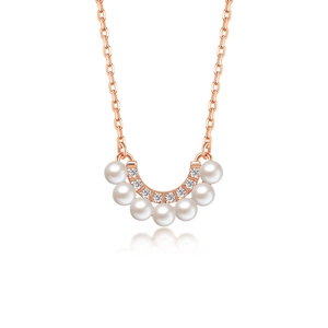 Elegant rose gold necklace with U-shaped pendant featuring pearls and sparkling diamonds